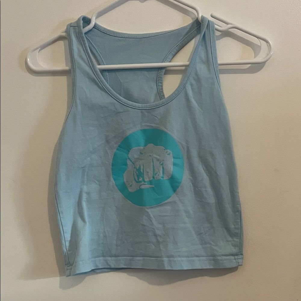 Light Blue Sleeveless Top with Fist